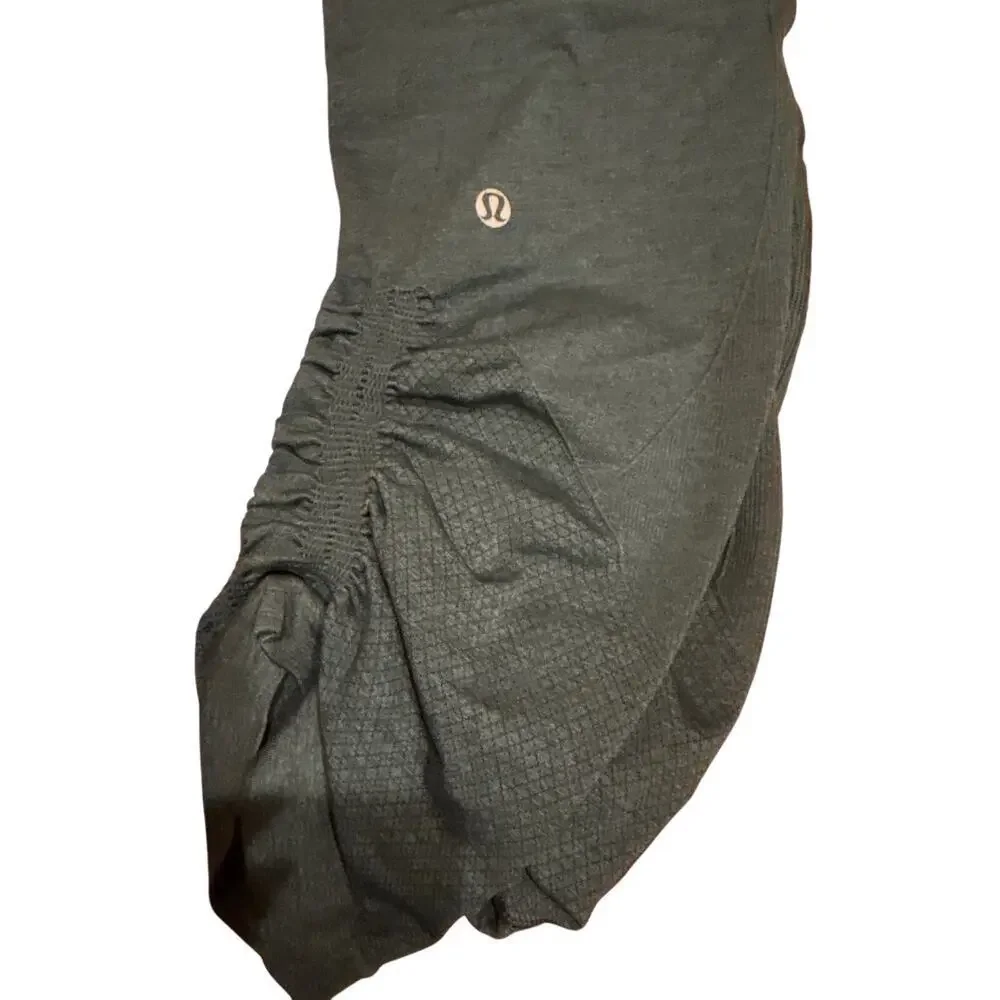 Lululemon In The Flow Crop Leggings Seamless Ruched cropped dark green size 6.
